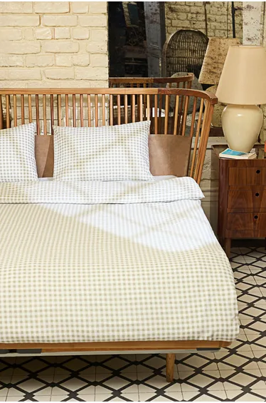 غطاء لحاف باللون الأخضر