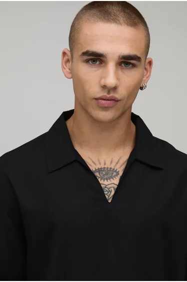 قميص كتان أسود بأكمام متوسطة الطول