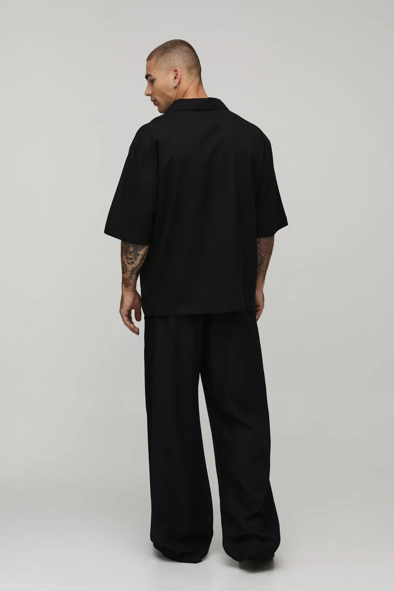 قميص كتان بتصميم واسع بياقة V - أسود - 1