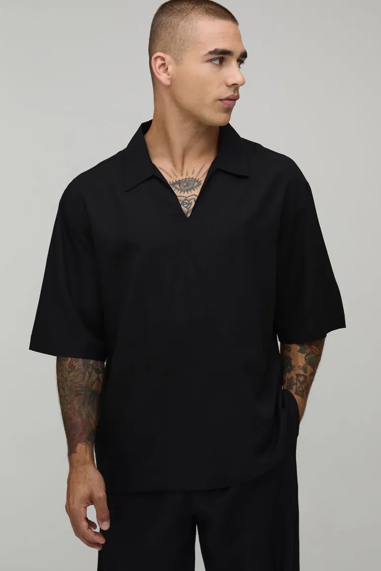 قميص كتان بتصميم واسع بياقة V - أسود
