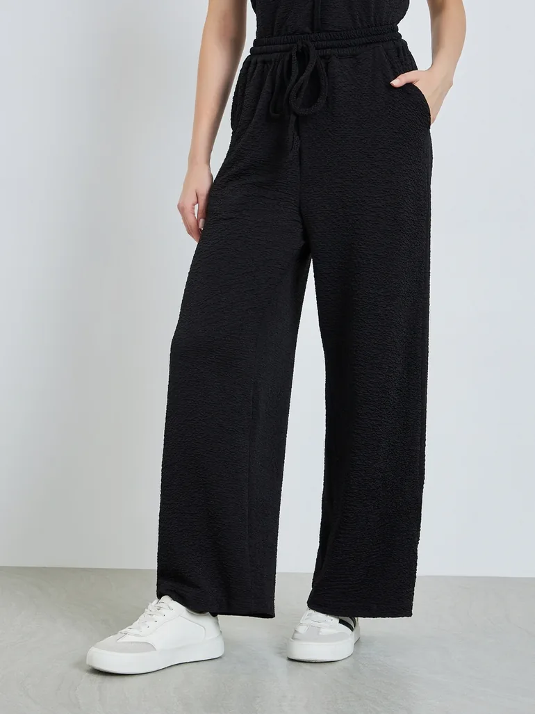 Women Black Wide Leg Trousers with Drawstring - 1