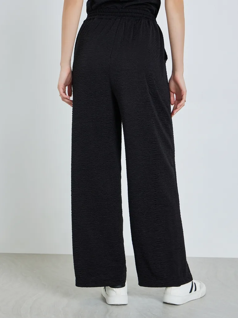 Women Black Wide Leg Trousers with Drawstring - 3