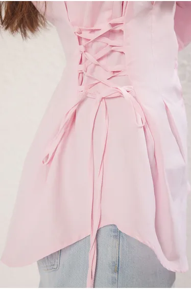 قميص بربطة خصر لون زهري