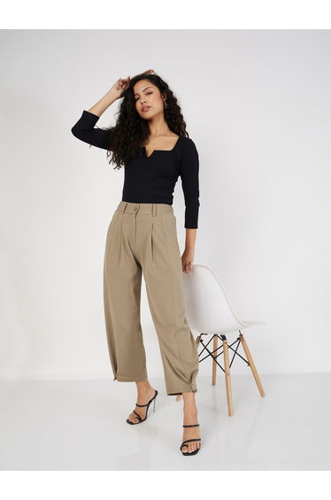Women Beige Solid Pleated Button Hem Balloon Pants