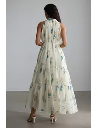 فستان ماكسي بياقة هالتر بطبعة أزهار - 9