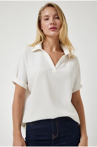 بلوزة محبوكة بياقة بولو