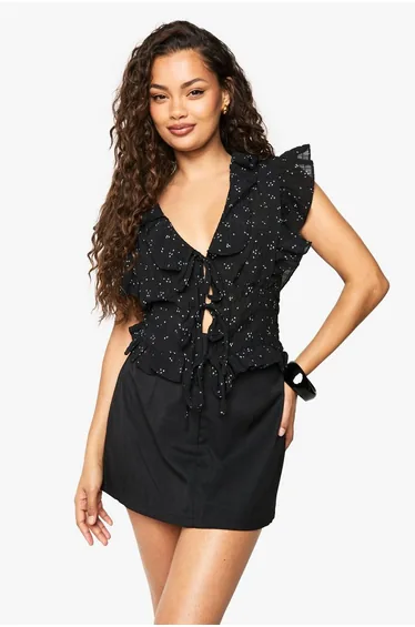 بلوزة بكشكش بربطة أمامية بطبعة أزهار - أسود