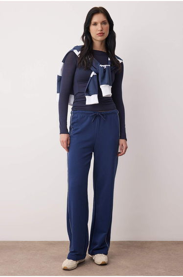 Navy blue wide leg knitted tracksuit bottoms with piping detail