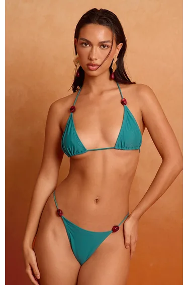 توب بكيني بتصميم مثلث بحواف خرز لون أزرق