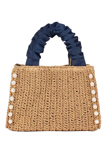 حقيبة يد باللون البيج