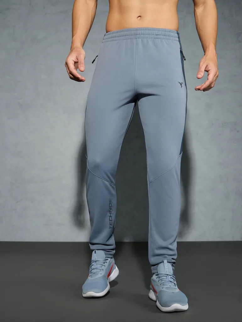 Men Solid Slim Fit Track Pants with TECHNO DRY