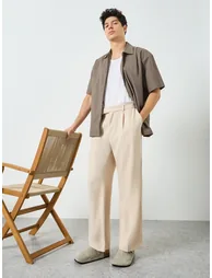 Men Beige Slant Pocket Pleated Straight Leg Pants