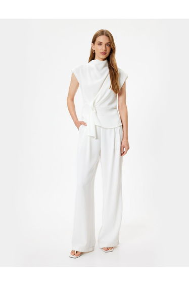Stand Collar Asymmetrical Knot Detail Sleeveless Blouse
