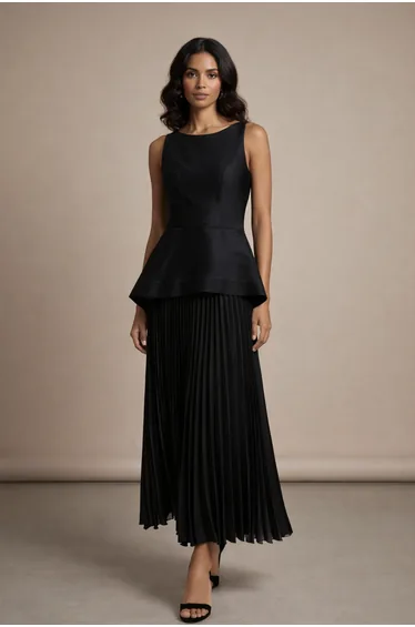 Designer sleeveless dress with fitted waist and pleated skirt