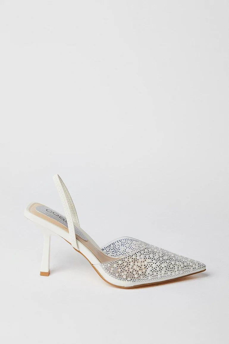 حذاء كعب عالي باللون الأبيض - 1