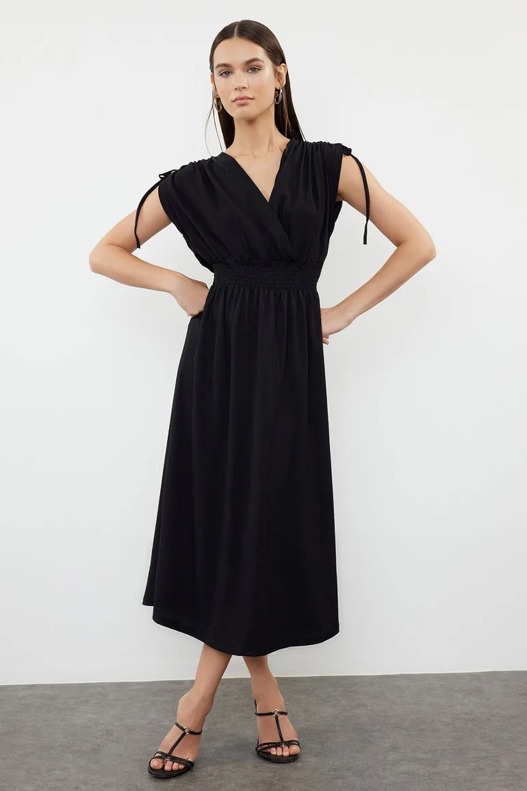Shop Black Plain Zero Sleeve Double Breasted Skater/Waist Opening Gathered  Flexible Midaxi Dress Knit Online in Oman