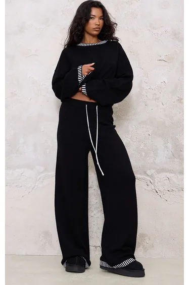 ستره صوف أسود محبوكه بقصة واسعة