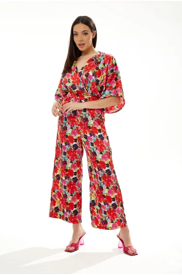 Women's Jumpsuit in Red with Short Kimono Sleeves and Floral Print.