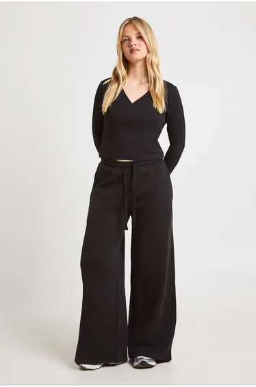 Petite Wrap Front Long Sleeve Top And Straight Leg Jogger Tracksuit - black