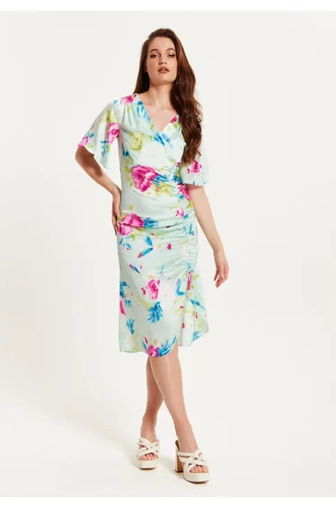 Women's Midi Wrap Dress with Kimono Sleeves and Floral Print in Mint Green.