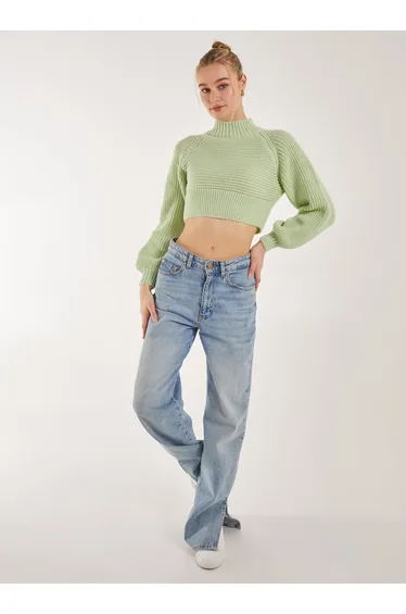 كنزة محبوك بياقة عالية