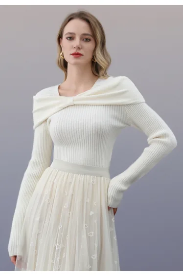 سويتر محبوك مضلع بفيونكة لون كريمي