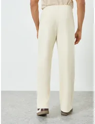 Men Cream Text Print Oversized Joggers - 4