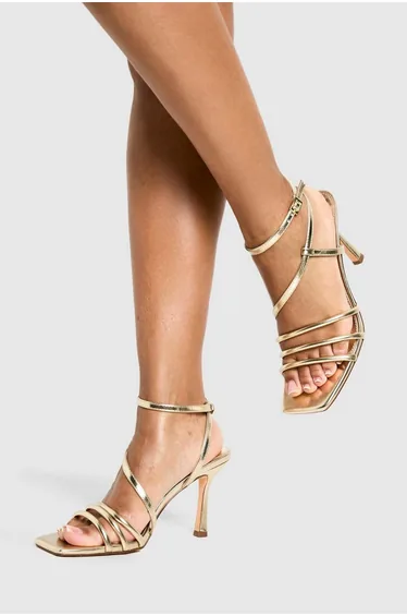 صندل بكعب عالي بوهو باللون الذهبي