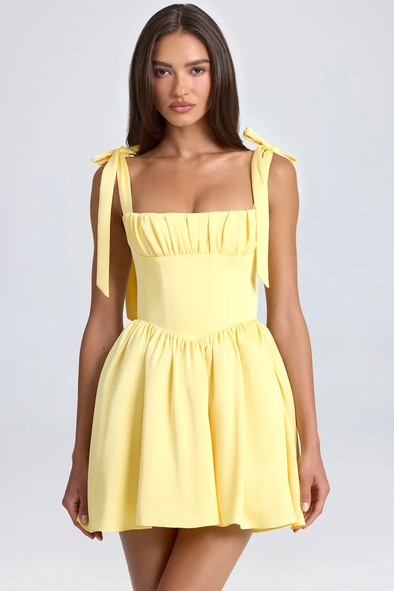 corset mini dress yellow Ashta Corset Mini Dress In Soft Yellw