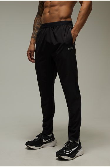 Man Active Running Perforated Tapered Jogger - black